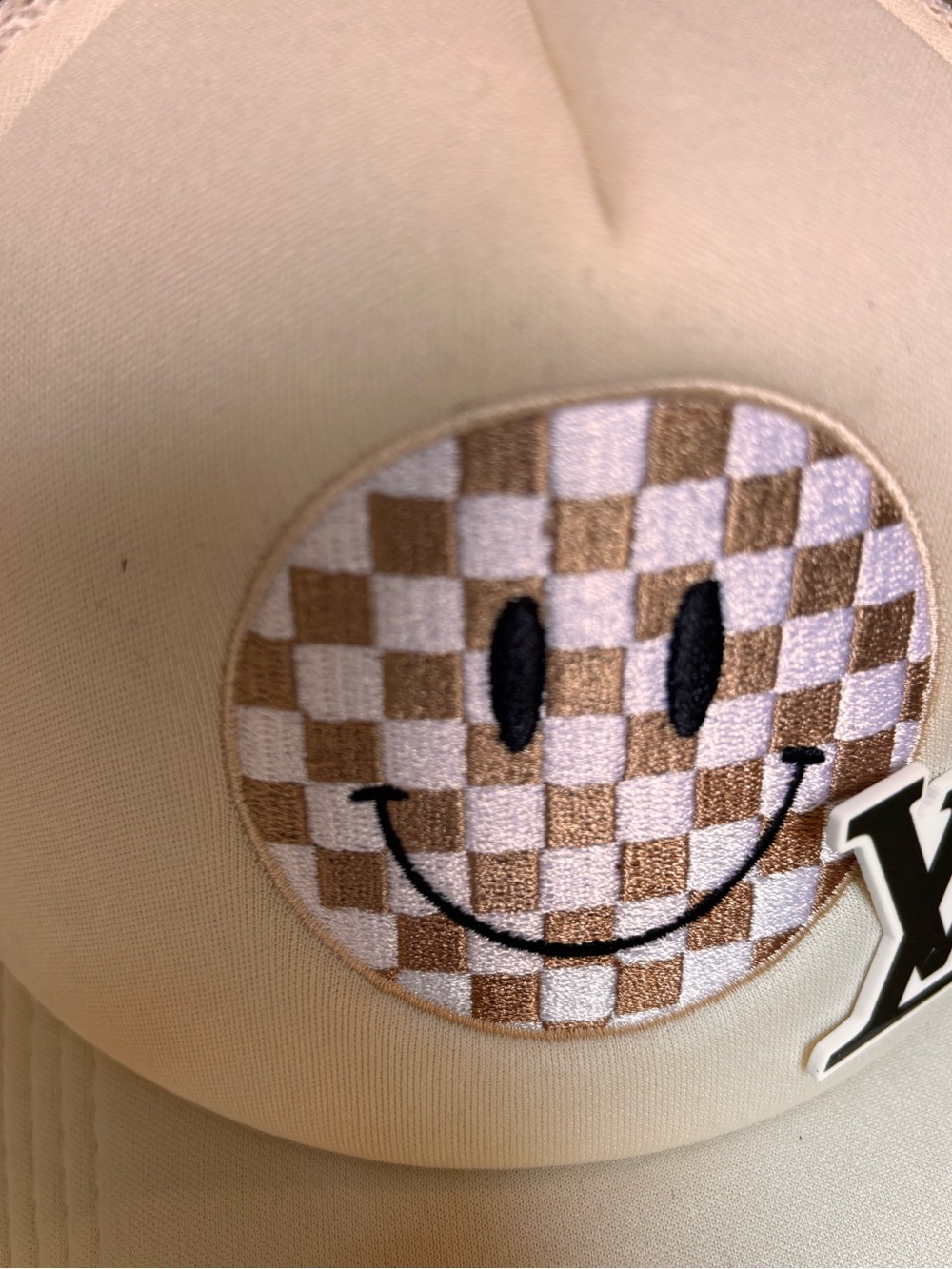 Beige snap back cap with Smiley Checkered Patch